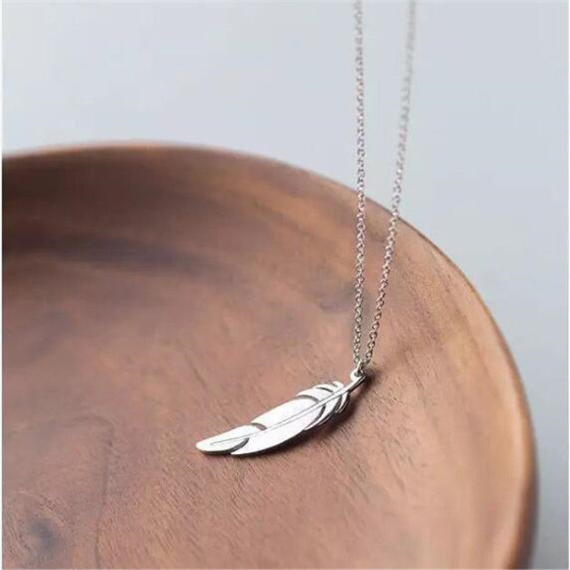 Divine Feather Glow Necklace